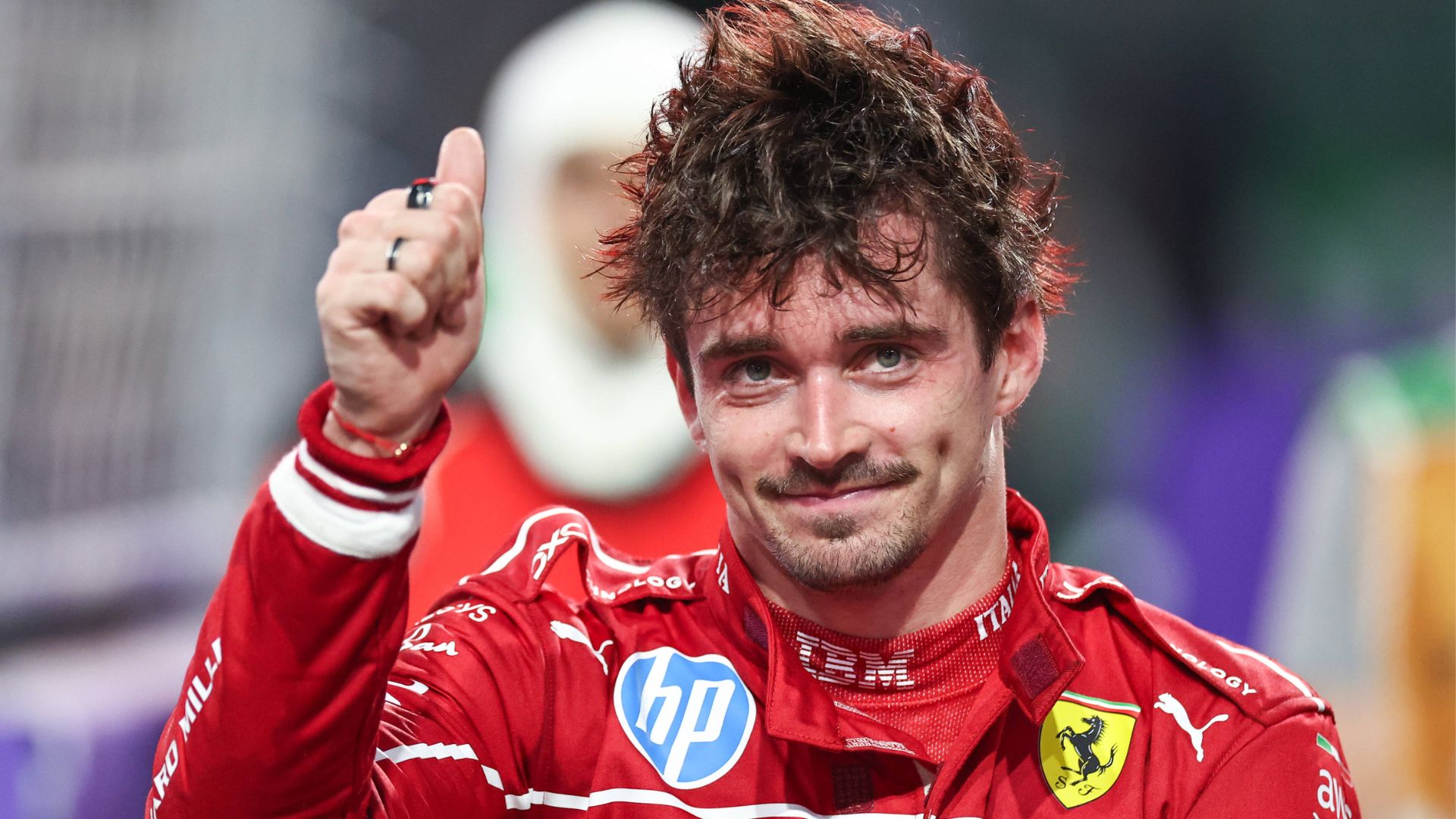 Charles Leclerc of Monaco and Scuderia Ferrari looks on in the parc ferme during the F1 Grand Prix of Saudi Arabia at Jeddah Corniche Circuit in Jeddah