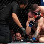 Khabib Nurmagomedov (red gloves) fights Conor McGregor (blue gloves) during UFC 229 at T-Mobile Arena.
