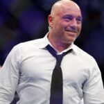 Joe Rogan after the fight between Amir Albazi (red gloves) and Francisco Figueiredo (blue gloves) during UFC 278 at Vivint Arena.