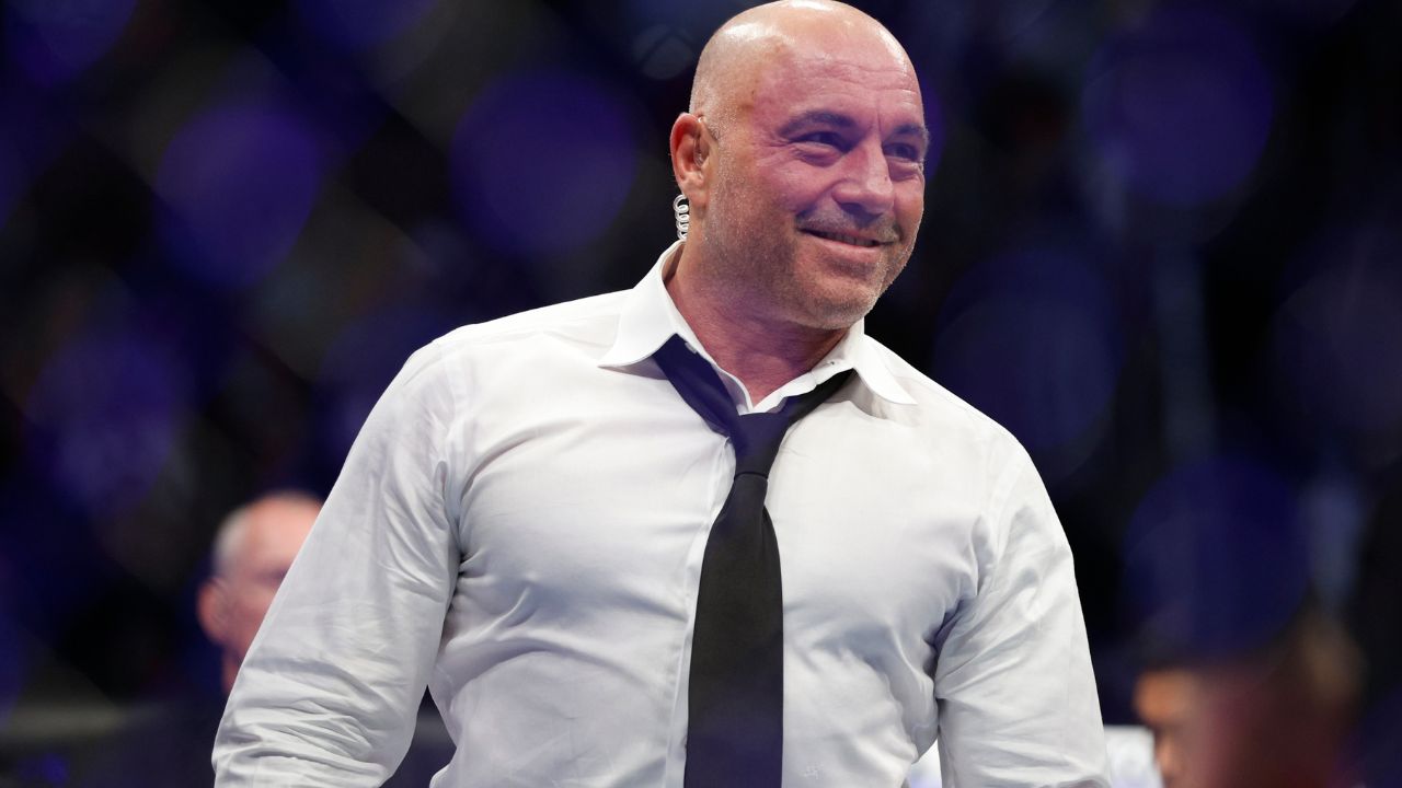 Joe Rogan after the fight between Amir Albazi (red gloves) and Francisco Figueiredo (blue gloves) during UFC 278 at Vivint Arena.
