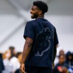 Colorado Buffaloes quarterback Shedeur Sanders (2) laughs during the University of Colorado NFL Showcase at the CU Indoor Practice Facility.