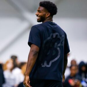 Colorado Buffaloes quarterback Shedeur Sanders (2) laughs during the University of Colorado NFL Showcase at the CU Indoor Practice Facility.