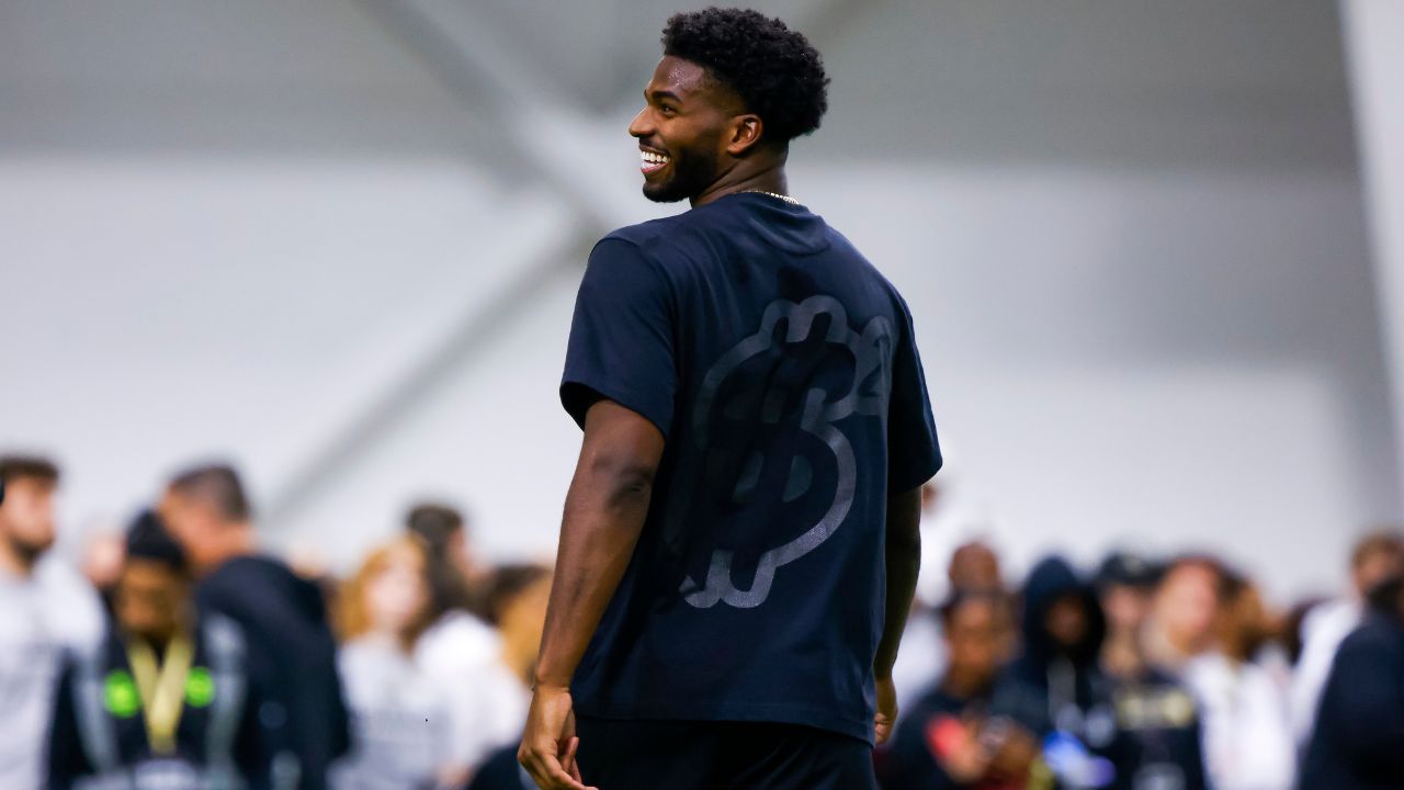 Colorado Buffaloes quarterback Shedeur Sanders (2) laughs during the University of Colorado NFL Showcase at the CU Indoor Practice Facility.