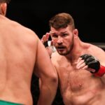 British mixed martial artist and actor Michael Bisping reacts as he competes against American mixed martial artist Kelvin Gastelum during the 2017 UFC Fight Night Shanghai