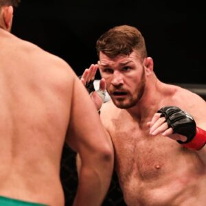 British mixed martial artist and actor Michael Bisping reacts as he competes against American mixed martial artist Kelvin Gastelum during the 2017 UFC Fight Night Shanghai