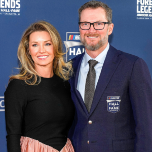 Jan 19, 2024; Charlotte, NC, USA; Dale Earnhardt Jr. and his wife Amy during the red carpet at Charlotte Convention Center Crown Ballroom. Mandatory Credit: Jim Dedmon-Imagn Images