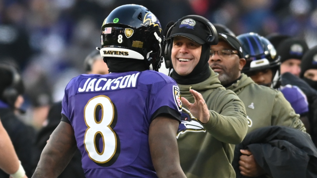 Nov 20, 2022; Baltimore, Maryland, USA; Baltimore Ravens head coach John Harbaugh greats Baltimore Ravens quarterback Lamar Jackson (8) after scoring a second half touchdown against the Carolina Panthers at M&T Bank Stadium.