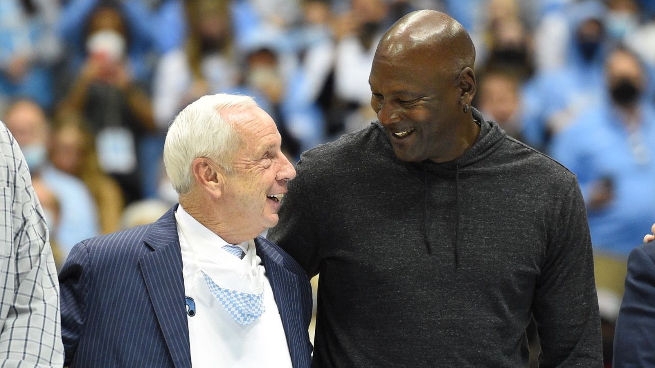 Former North Carolina Tar Heels head coach Roy Williams with former UNC great Michael Jordan on the court as they were honored as part of the 1982 national championship team in the second half at Dean E. Smith Center.