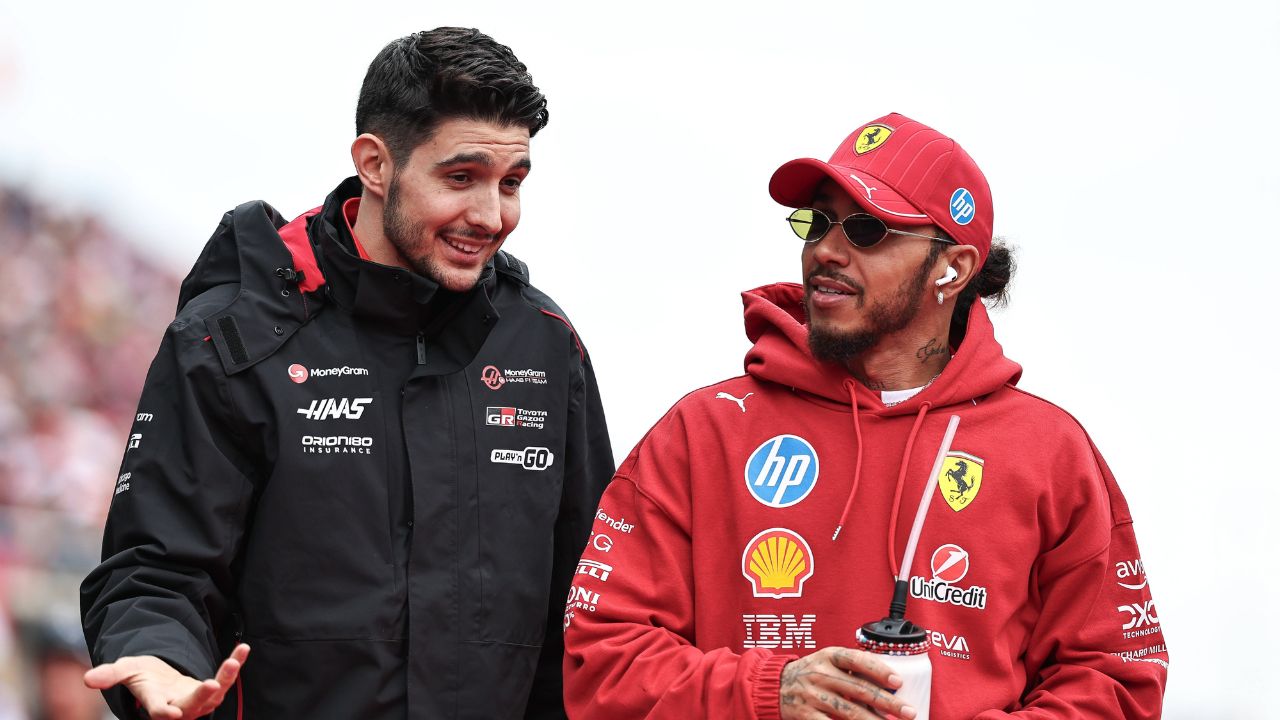 F1 Grand Prix Of Japan Esteban Ocon of France and the MoneyGram Haas F1 Team and Lewis Hamilton of Great Britain and Scuderia Ferrari look on before the F1 Grand Prix of Japan at Suzuka Circuit in Suzuka, Japan, on April 6, 2025