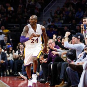 Fans cheer for Los Angeles Lakers forward Kobe Bryant (24) after making a basket during the third quarter against the Detroit Pistons at The Palace of Auburn Hills. Pistons win 111-91