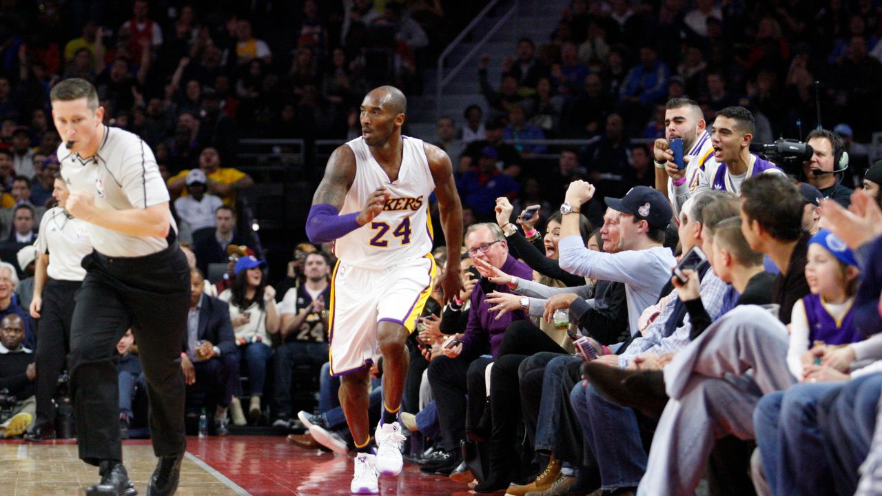 Fans cheer for Los Angeles Lakers forward Kobe Bryant (24) after making a basket during the third quarter against the Detroit Pistons at The Palace of Auburn Hills. Pistons win 111-91