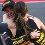 DEWALT Toyota driver Christopher Bell (20) hugs his wife Morgan Bell after winning the NASCAR Cup Series EchoPark Automotive Grand Prix at Circuit of the Americas on Sunday, March 2, 2025 in Austin.