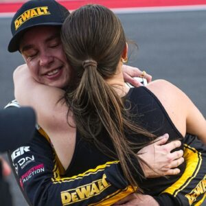 DEWALT Toyota driver Christopher Bell (20) hugs his wife Morgan Bell after winning the NASCAR Cup Series EchoPark Automotive Grand Prix at Circuit of the Americas on Sunday, March 2, 2025 in Austin.