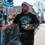 Philadelphia Eagles offensive tackle Jordan Mailata (68) celebrates during the Super Bowl LIX championship parade and rally.