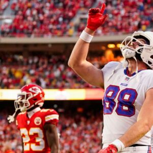 Buffalo Bills tight end Dawson Knox (88) celebrates after scoring a touchdown during the second half against the Kansas City Chiefs at GEHA Field at Arrowhead Stadium.