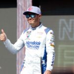 Kyle Larson (5) walks out onto the stage for driver introductions before the EchoPark Automotive Grand Prix at Circuit of the Americas.