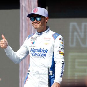 Kyle Larson (5) walks out onto the stage for driver introductions before the EchoPark Automotive Grand Prix at Circuit of the Americas.