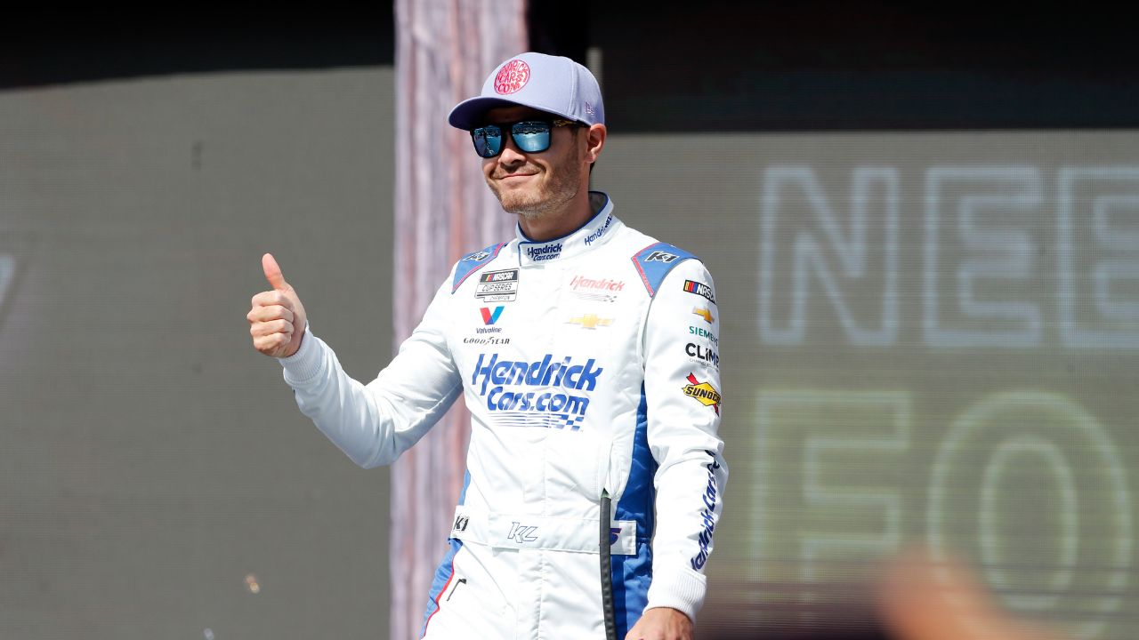 Kyle Larson (5) walks out onto the stage for driver introductions before the EchoPark Automotive Grand Prix at Circuit of the Americas.