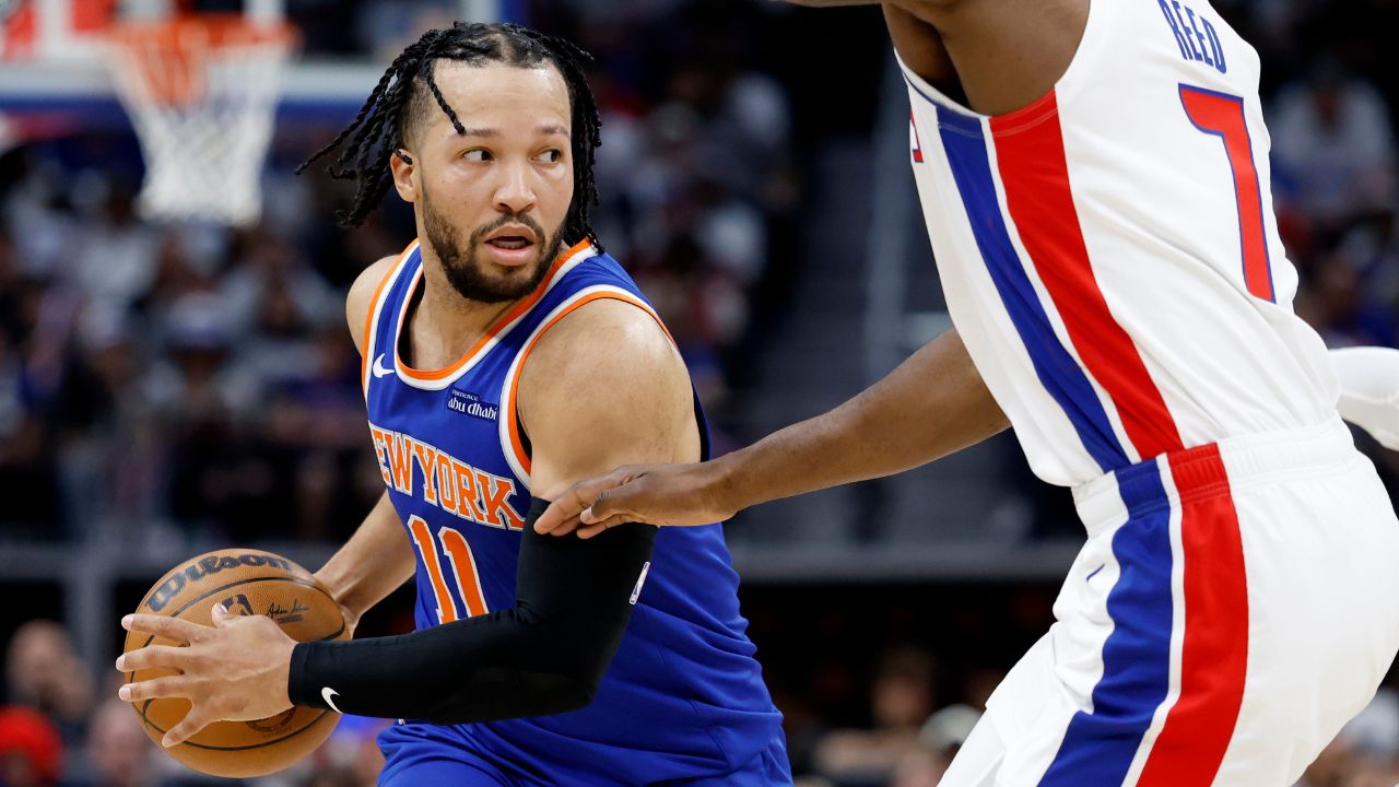 New York Knicks guard Jalen Brunson (11) is defended by Detroit Pistons forward Paul Reed (7) in the first half during game three of first round for the 2024 NBA Playoffs at Little Caesars Arena.