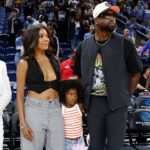 Former basketball player Dwyane Wade attends with his wife Gabrielle Union a WNBA game between the Chicago Sky and Connecticut Sun at Wintrust Arena