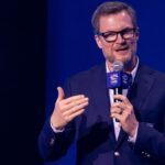 Dale Earnhardt Jr. talks about his future during the 2025 NASCAR Hall Of Fame inductions at Charlotte Convention Center Crown Ballroom.