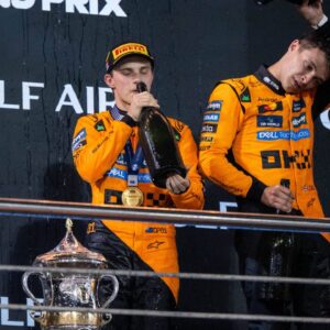 Oscar Piastri McLaren Formula 1 Team, Australia, 81 celebrates first place and victory on the podium at the podium ceremony, behind him Lando Norris McLaren Formula 1 Team, Great Britain, 04 , BAH, Formula 1 World Championship, Gulf Air Grand Prix of Bahrain, Bahrain International Circuit, Race, 2025 season