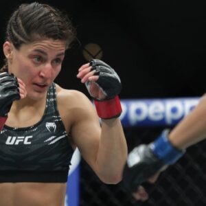 Loopy Godinez of Mexico (L) against Julia Polastri of Brazil in a strawweight fight during the UFC Fight Night event at Mexico City Arena. on March 29, 2025 in Mexico City, Mexico.