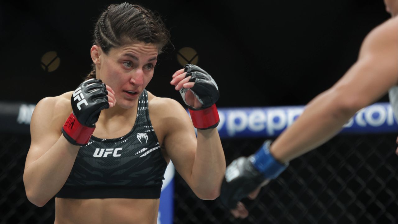 Loopy Godinez of Mexico (L) against Julia Polastri of Brazil in a strawweight fight during the UFC Fight Night event at Mexico City Arena. on March 29, 2025 in Mexico City, Mexico.