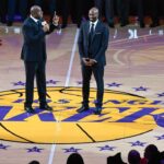 arvin \"Magic\" Johnson addresses the Staples Center crowd during a halftime ceremony retiring Kobe Bryant's two uniform numbers.