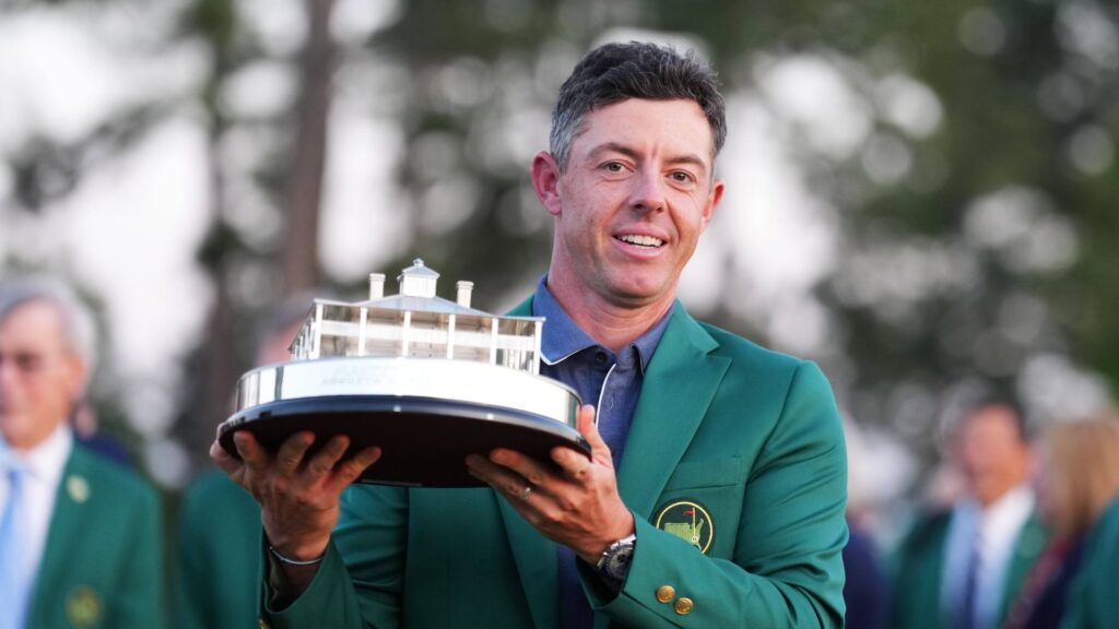 Rory McIlroy of Northern Ireland celebrates with the trophy after winning the 2025 Masters golf tournament at Augusta National Golf Club in Augusta, the United States