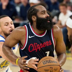 LA Clippers guard James Harden (1) drives to the basket as Golden State Warriors guard Stephen Curry (30) extends for the ball during the third quarter at Chase Center.
