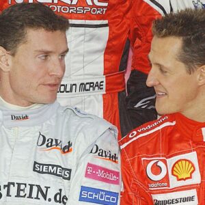 David Coulthard and German Formula One champion Michael Schumacher during the Race of Champions exhibition at the Stade de France stadium outside Paris, Saturday December 4, 2004