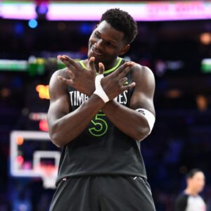 Minnesota Timberwolves guard Anthony Edwards (5) reacts after scoring against the Philadelphia 76ers in the fourth quarter at Wells Fargo Center.