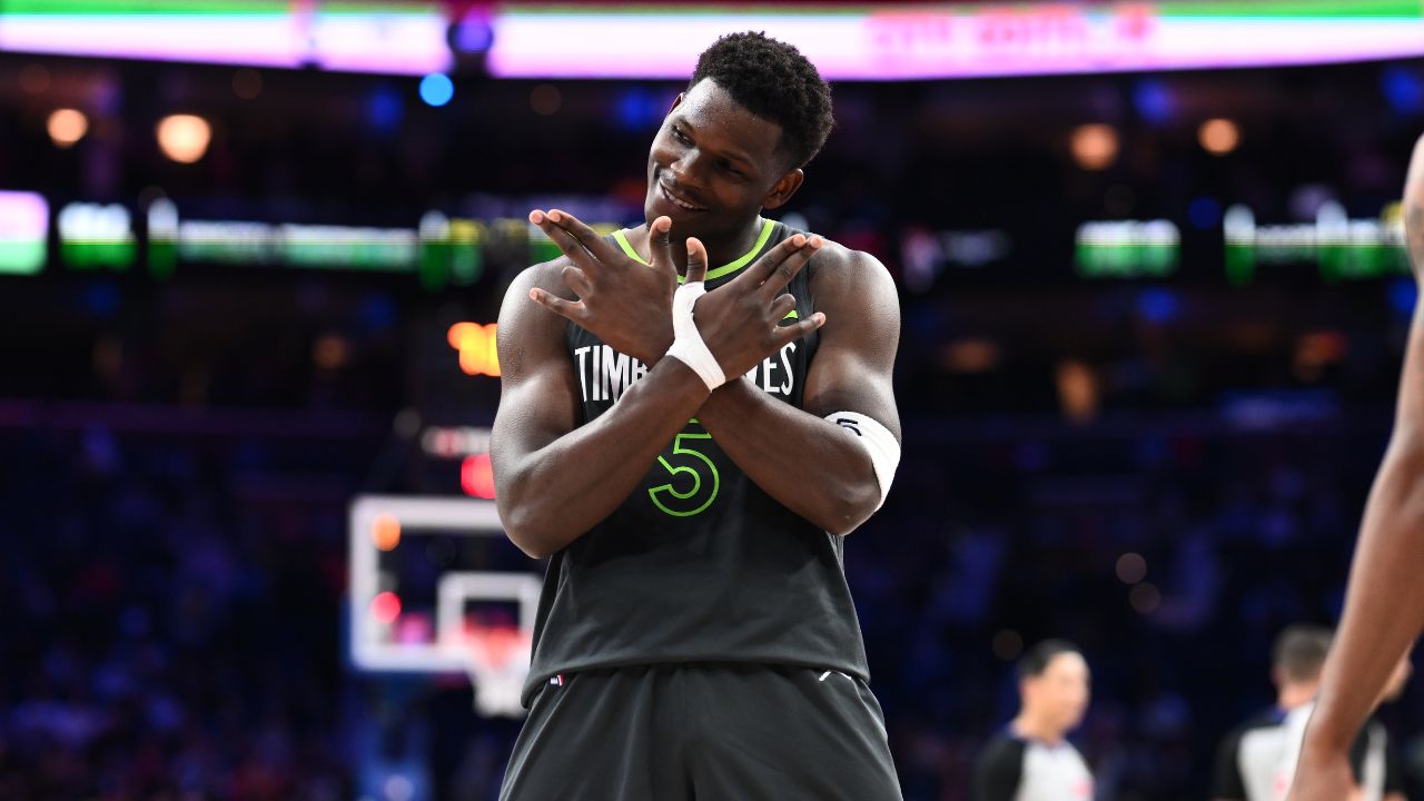 Minnesota Timberwolves guard Anthony Edwards (5) reacts after scoring against the Philadelphia 76ers in the fourth quarter at Wells Fargo Center.