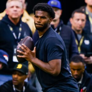 Apr 4, 2025; Boulder, CO, USA; Colorado Buffaloes quarterback Shedeur Sanders (2) looks to make a pass at the University of Colorado NFL Showcase at the CU Indoor Practice Facility.