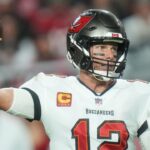 Tampa Bay Buccaneers quarterback Tom Brady (12) throws the ball against the Arizona Cardinals at State Farm Stadium in Glendale on Dec. 25, 2022.
