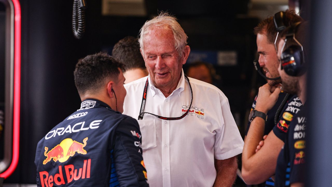 Isack Hadjar of Red Bull Racing RB20 and Helmut Marko, Drivers Manager of Red Bull Racing, are present during the F1 Grand Prix of Abu Dhabi at Yas Marina Circuit in Abu Dhabi, United Arab Emirates, on December 5, 2024