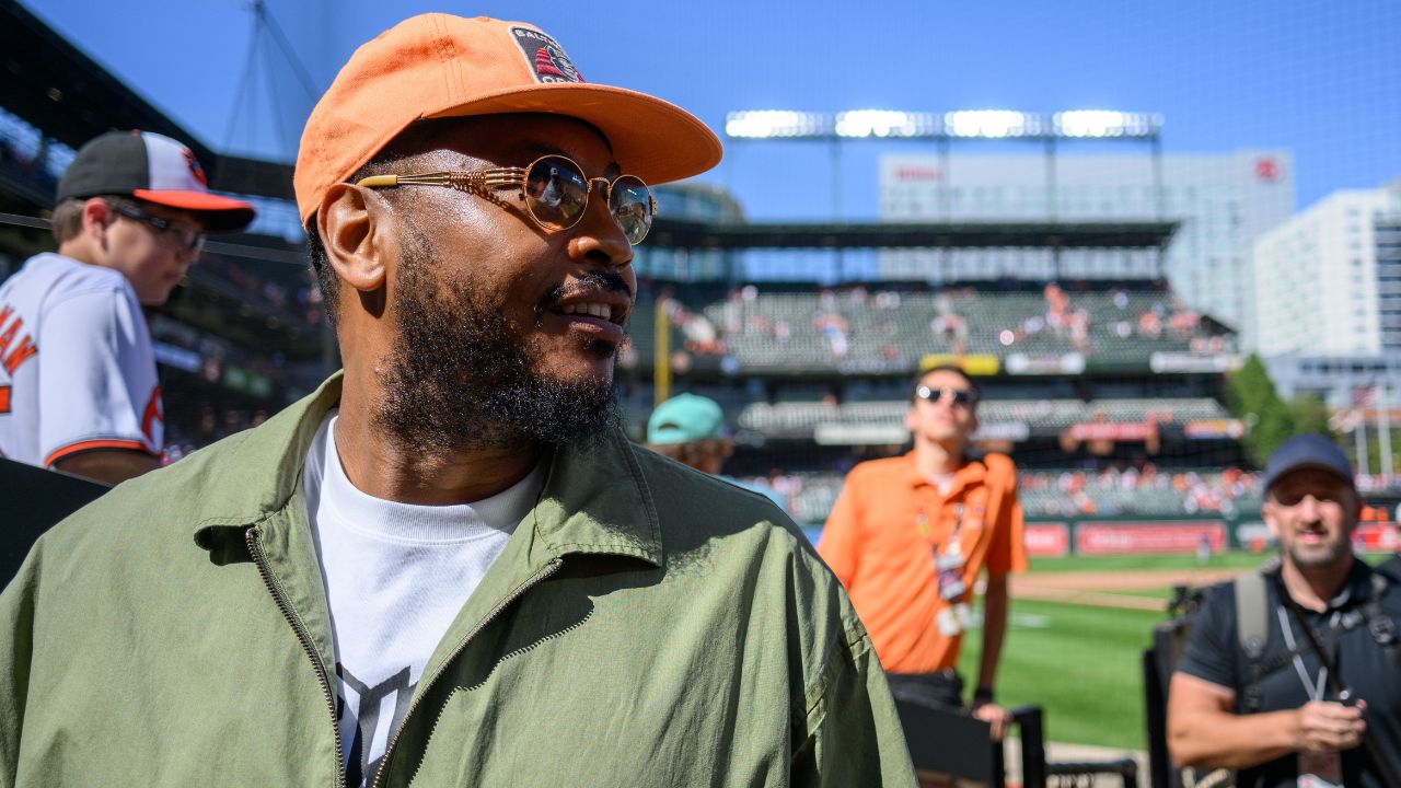 Former professional basketball player Carmelo Anthony looks on after the game between the Baltimore Orioles and the Tampa Bay Rays at Oriole Park at Camden Yards.