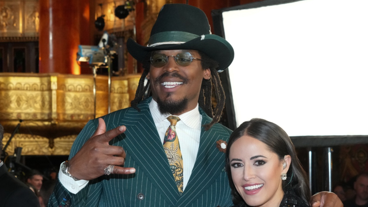 Apr 25, 2024; Detroit, MI, USA; Former NFL quarterback Cam Newton and broadcaster Kaylee Hartung pose for a photograph on the red carpet ahead of the 2024 NFL Draft at Detroit’s Fox Theatre.