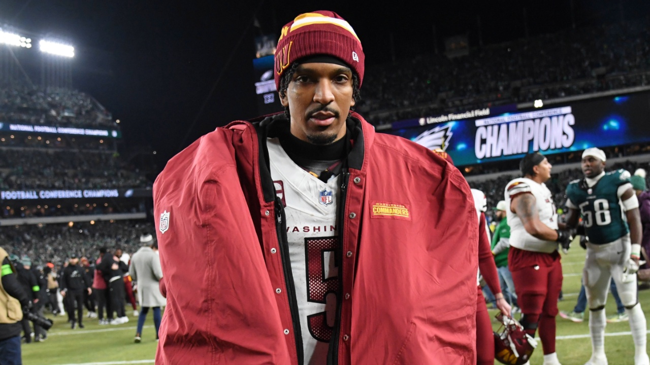 Washington Commanders quarterback Jayden Daniels (5) walks off the field after losing the NFC Championship game against the Philadelphia Eagles at Lincoln Financial Field.