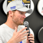 Monster Energy NASCAR Cup Series driver Dale Earnhardt Jr. (88) talks with the media during qualifying for the ISM Connect 300 at the New Hampshire Motor Speedway.