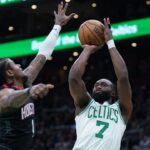 Boston Celtics guard Jaylen Brown (7) shoots against Houston Rockets guard Jalen Green (4) in the first quarter at TD Garden