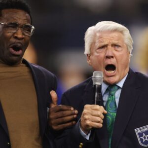 (L to R) Former Dallas Cowboys Michael Irvin, Jimmy Johnson and Emmitt Smith react during the Ring of Honor ceremony at the half time of the game against the Detroit Lions at AT&T Stadium