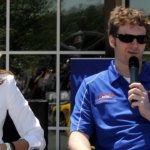 April 29, 2010; Mooresville, NC, USA; NASCAR team owners Teresa Earnhardt (left) and Dale Earnhardt Jr. (center) speak at a press conference at the Daytona International Speedway. Mandatory Credit: Sam Sharpe-Imagn Images