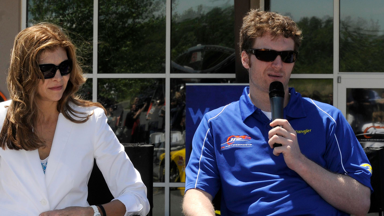 April 29, 2010; Mooresville, NC, USA; NASCAR team owners Teresa Earnhardt (left) and Dale Earnhardt Jr. (center) speak at a press conference at the Daytona International Speedway. Mandatory Credit: Sam Sharpe-Imagn Images