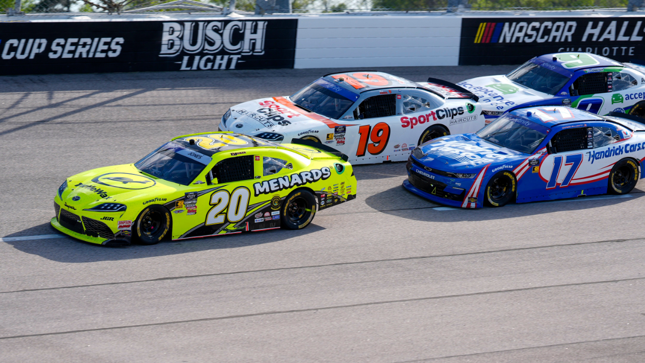 Apr 5, 2025; Darlington, South Carolina, USA; NASCAR Xfinity Series driver Brandon Jones (20) leads driver Christopher Bell (19) and the field into turn one during the Great Clips 200 at Darlington Raceway. Mandatory Credit: Jim Dedmon-Imagn Images