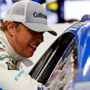 Feb 14, 2025; Daytona Beach, Florida, USA; NASCAR Cup Series driver Brad Keselowski (6) talks to NASCAR Cup Series driver Chris Buescher (17) during practice for the Daytona 500 at Daytona International Speedway. Mandatory Credit: Peter Casey-Imagn Images