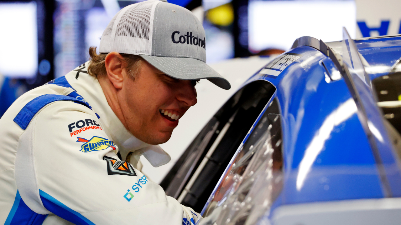 Feb 14, 2025; Daytona Beach, Florida, USA; NASCAR Cup Series driver Brad Keselowski (6) talks to NASCAR Cup Series driver Chris Buescher (17) during practice for the Daytona 500 at Daytona International Speedway. Mandatory Credit: Peter Casey-Imagn Images