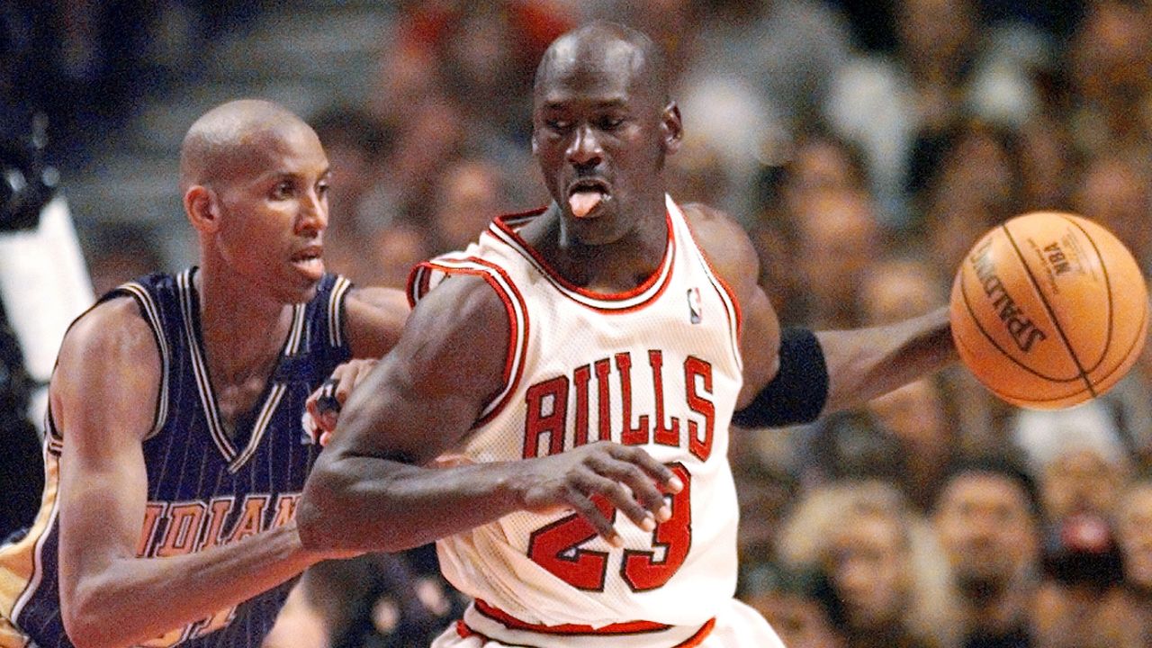May 31, 1998; Chicago, IL, USA; Chicago Bulls guard Michael Jordan (23), right, is guarded by Indiana Pacers player Reggie Miller (31) in the second half at the United Center. Mandatory Credit: Anne Ryan-USA TODAY