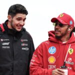 Esteban Ocon of France and the MoneyGram Haas F1 Team and Lewis Hamilton of Great Britain and Scuderia Ferrari look on before the F1 Grand Prix of Japan at Suzuka Circuit in Suzuka, Japan, on April 6, 2025